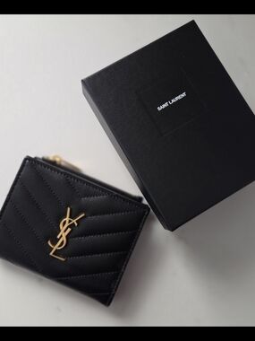 YSL Cassandre bi-fold wallet in grain de poudre leather